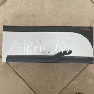 Airflow 2 in 1 hair curler and straightener.